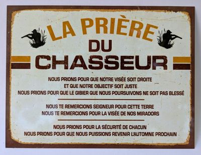 enseigne en français du restaurant « Chasseur » à Paris, en France
