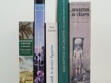 three books that are stacked on top of each other