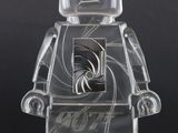 the lego figure is made out of clear plastic and has a black background