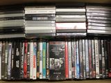 a lot of dvds in a box on the table
