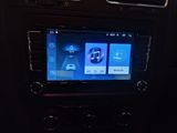 an image of a car dashboard with a car radio in the center