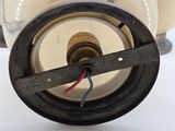 a close up of a small electric device with wires