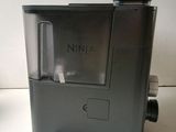 a black and white photo of a nintendo wii game console