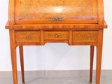 an old wooden desk with drawers and a drawer underneath it