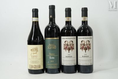 four bottles of wine are lined up on a white surface