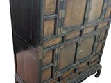 an image of a wooden chest of drawers on wheels