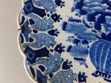 a blue and white plate with a blue and white design on it