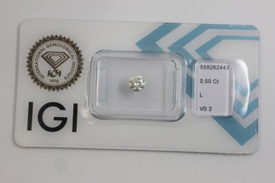 a diamond in a card with a sticker on it