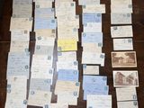 a lot of old letters on the table
