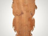 an old wooden sculpture of a bear on a white background