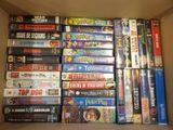 a lot of video games in a cardboard box