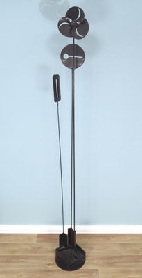 a picture of a floor lamp in a room with a wooden floor
