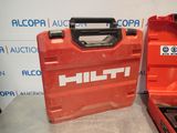 a red tool case sitting next to a red tool box