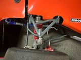 a close up of the front suspension of a race car
