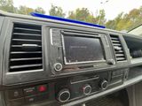a car dashboard with a radio and other electronics in it