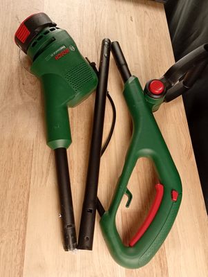 two tools that are sitting on a table