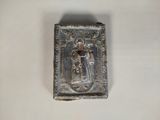 an image of a small silver box with a picture of a man holding a sword