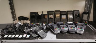 many different types of cell phones sitting on a table