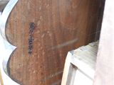 a wooden table with a mirror on top of it
