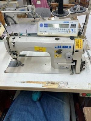 a sewing machine that is sitting on a table