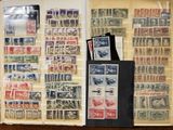 a lot of stamps on display in a book