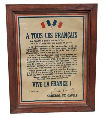 a framed poster of a french flag and a medal on display