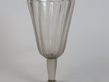 a glass that is sitting on a table