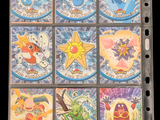 a lot of different pokemon cards on a black background