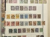 an open book with a bunch of stamps on it