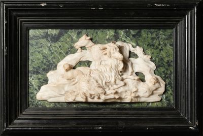 une photo représentant la statue d'un homme et d'un chien