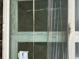 a window that has been taped up and taped up