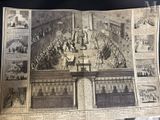 an old newspaper with a picture of a large group of people in a room