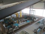 an aerial view of a factory with a conveyor belt and a conveyor belt