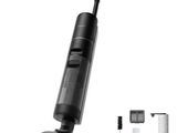 a close up of a vacuum cleaner with a brush and other items