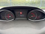 the dashboard of a car with three gauges and a clock on it