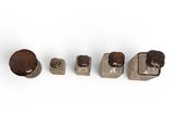 four different types of screws and nuts on a white surface