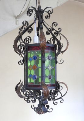 a lamp hanging from the ceiling in a room
