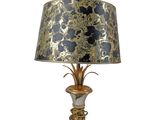 an image of a lamp with a black and gold shade on it