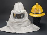 a yellow fireman ' s helmet and a yellow fireman ' s helmet