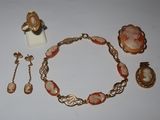 an image of a collection of jewelry including a necklace, bracelet, and ring