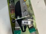 a pair of pliers on a table with a price tag