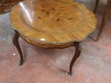 a table that has a wooden top on it