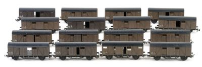 a lot of small wooden train cars on a white surface