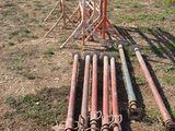 many pipes that are sitting on the ground