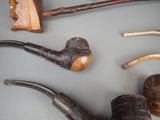 many different types of pipes and pipes on the table