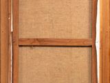 an old wooden window frame with a burlock cloth covering the window