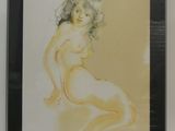 peinture d'une femme nue dans un cadre noir sur un mur blanc