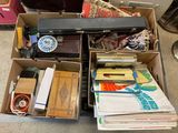 a box full of assorted items sitting on the floor