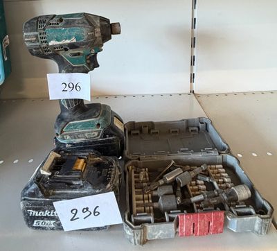 two tools that are sitting on a shelf in a store