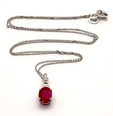 Chaine et son pendentif le tout en or blanc 18k 750ml serti …